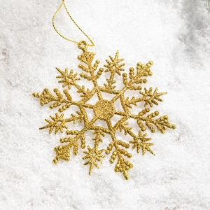 Golden glitter snowflake ornament for Christmas tree decoration with hanging string