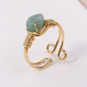 Handmade gold wire-wrapped ring with green natural crushed stone and adjustable open band