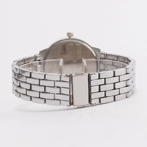 Silver quartz wristwatch for women featuring a link chain metal strap and folding clasp back