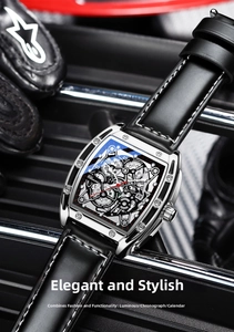 Macro shot of tonneau quartz watch featuring a skeleton dial and luminous markers