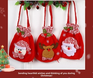 Detailed plush Christmas drawstring gift bags featuring 3D Santa, reindeer, and snowman designs
