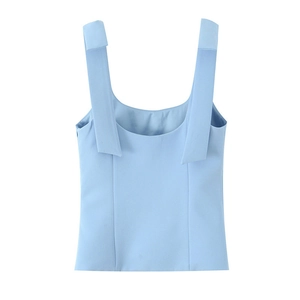 Detailed view of light blue sleeveless top with wide straps and square neckline