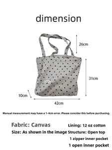 Detailed size guide for large canvas tote bag featuring polka dots and bow design