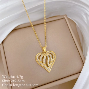 Golden heart pendant necklace in jewelry box showing 40+5cm chain length details