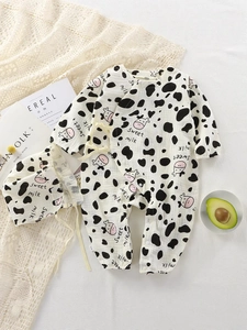 Adorable cow print soft cotton gauze baby romper and matching hat set for newborns
