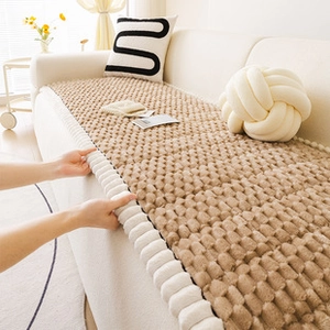 Detailed close-up of brown thickened plush cushion with warm stereoscopic texture