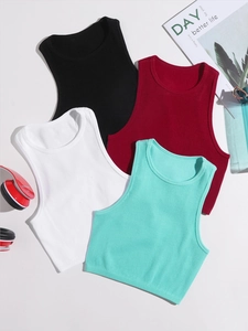 Flat lay of ribbed knit sports tank tops in black, white, burgundy, and cyan blue colors