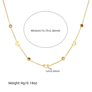 Elegant gold stainless steel heart necklace with circular charms on a white background