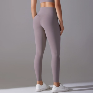 Detail view of high-waist lilac yoga pants showing seamless butt-lifting design