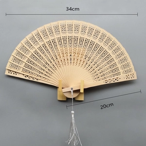 8 inch wooden sandalwood folding fan with hollow dolphin design and white tassel