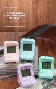 Mini retro arcade game console keychains in pastel colors for backpacks and bags