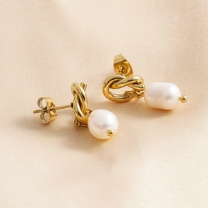 Elegant 18K gold-plated knot earrings with hanging oval white natural pearls