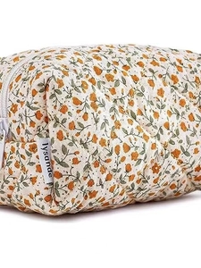 Quilted cotton makeup bag featuring orange floral patterns and a secure white zipper