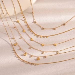 18K gold plated layered necklaces with heart, butterfly, and zircon charms set