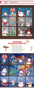 Detailed view of Christmas window decals featuring Santa, reindeer and snowman designs