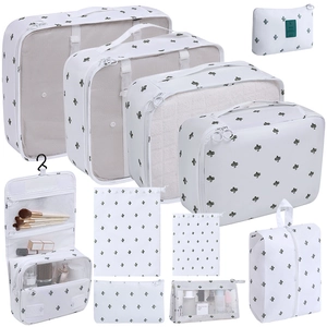 9-piece travel organizer set with white cactus pattern for clothes and toiletries