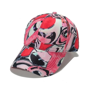 Pink and red abstract graffiti print baseball cap with a classic six-panel structure