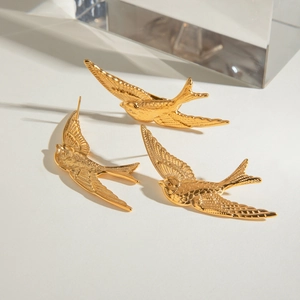 Vintage golden stainless steel swallow stud earrings with detailed feather texture