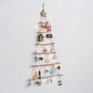 Minimalist wooden wall-mounted Christmas tree with LED lights and rustic ornaments