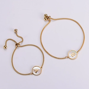 Adjustable 18k gold plated stainless steel bracelet with white shell A-Z initial charms