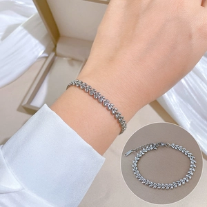 Detail of silver leaf wheat chain bracelet with lobster clasp and extension chain