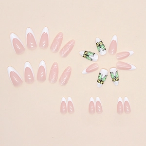Almond press-on nails with white French tips, green butterfly motifs, and marble textures