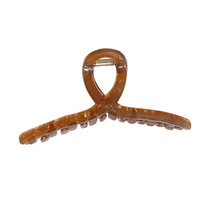 Minimalist brown plastic hair claw clip for women in a sleek Korean style cross design