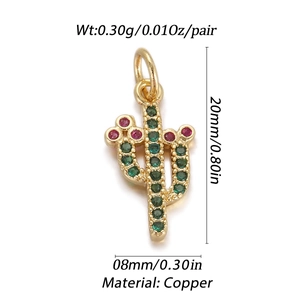 Detail view of a 18K gold-plated cactus pendant with green and pink crystal stones