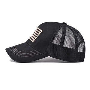 Classic black trucker hat with mesh back and embroidered stripe patch on front crown