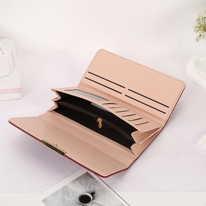 Detailed interior of quilted long wallet featuring multiple card slots and a zipper pocket