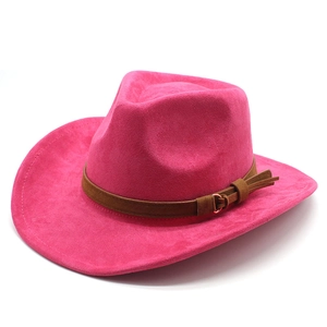 Detail of rose pink suede western cowboy hat with brown leather band and metallic buckle
