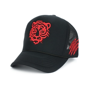 Close-up of red tiger head embroidery and mesh back on the black trucker hat