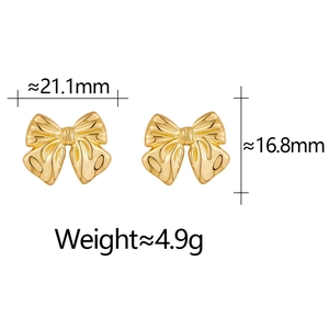 Detailed view of golden bow earrings with measurements 21.1mm width and 16.8mm height