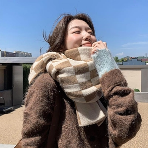 Cozy checkered knit scarf in beige and brown for women paired with winter cardigan