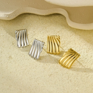 Square geometric stud earrings in gold and silver finish with fan textured stainless steel