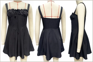 Detailed views of a black strapless mini dress with ruffled neckline and bow tie detail