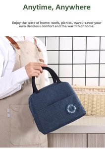 Macro detail of navy blue lunch bag showing the panda logo and durable oxford fabric