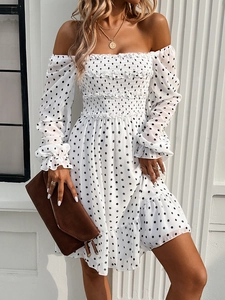 Chiffon white polka dot off-shoulder dress with long sleeves and smocked waist detail