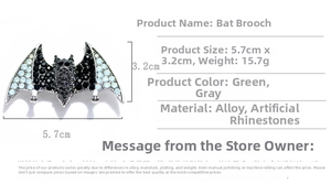 Detail view of rhinestone bat brooch measuring 5.7cm by 3.2cm with weight specifications