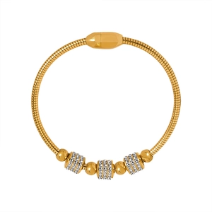 Luxury gold titanium steel bracelet with pavé rhinestones and a magnetic clasp closure