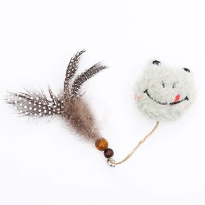 Cat toy with wool felt sheep head, feathers, wooden beads, and a small bell on white background