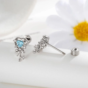 Exquisite silver bow heart key earrings with blue zircon stones and screw back closures