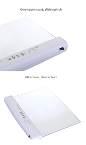 Detail view of the flat LED reading light with a power switch and a transparent panel