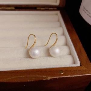 Élégantes boucles d'oreilles en perles d'eau douce argent 999 avec crochets dorés