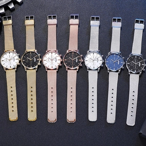Detailed display of Geneva men's fashion quartz watches in seven assorted metal mesh colors