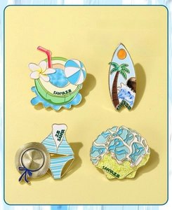 Detail of colorful zinc alloy fridge magnets with summer beach and Sanya island themes