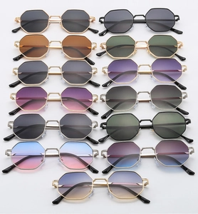 Matrix display of octagonal metal frame sunglasses in various gradient lens colors
