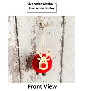 Detail of red pompom reindeer ornament with wooden head for Christmas tree decoration