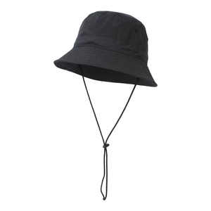 Detail of black sun hat featuring an adjustable chin strap and secure toggle closure