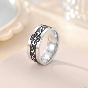 Detailed macro view of retro titanium steel ring with engraved wave patterns